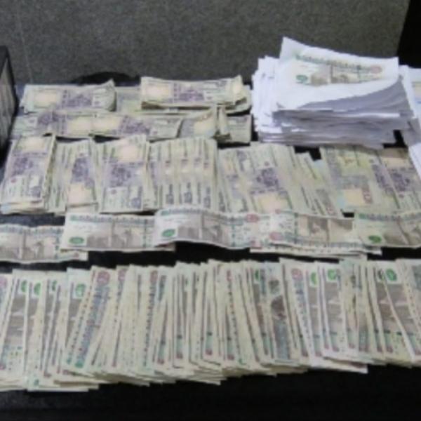 حبس متهمين بترويج العملات المالية المقلدة في منطقة الخليفة
