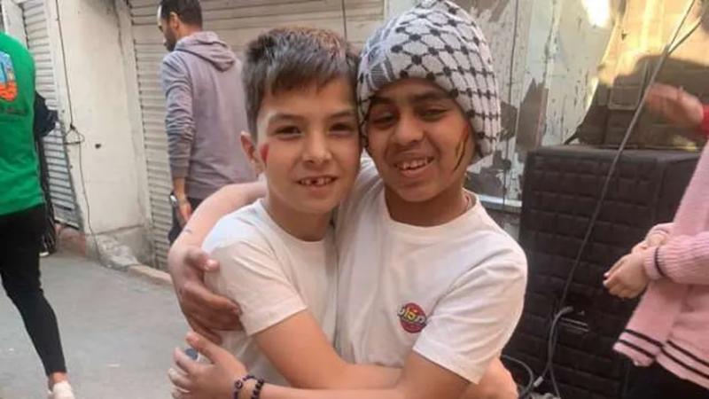 طفلان من غزة يشاركان في إفطار المطرية: «نحب مصر وفرحتنا كبيرة»